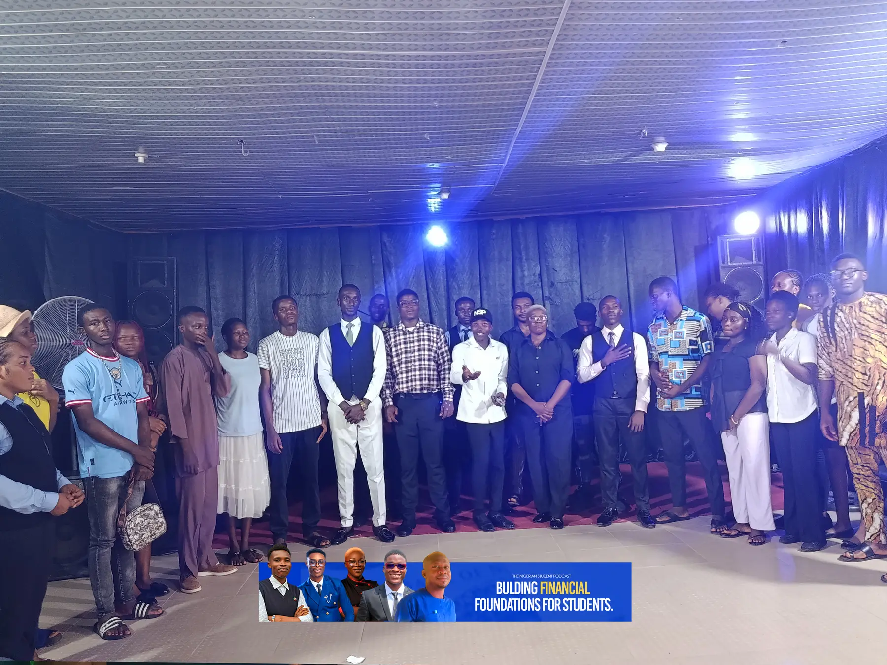 Students and speakers line up on stage at the Money Matters Masterclass, Alumni Hall, MOUAU