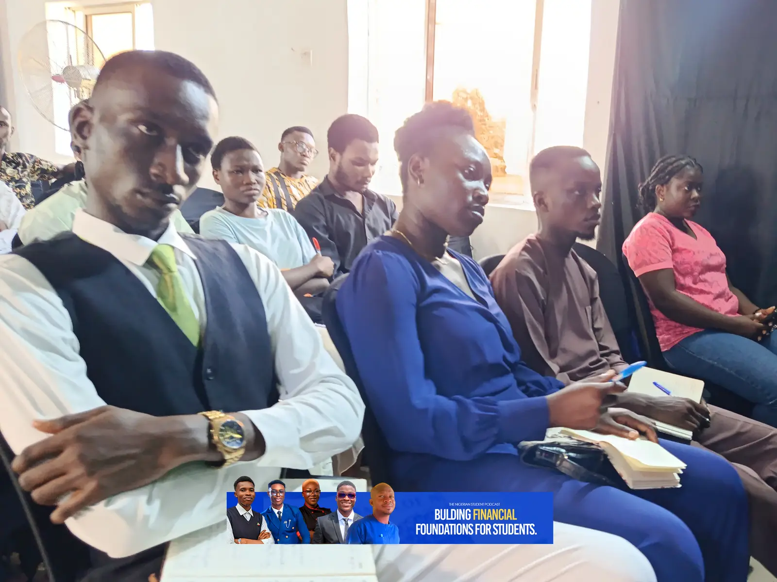 Students listening in the audience
