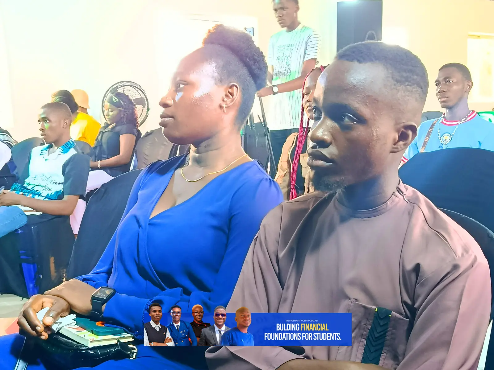 Two attendees in the audience
