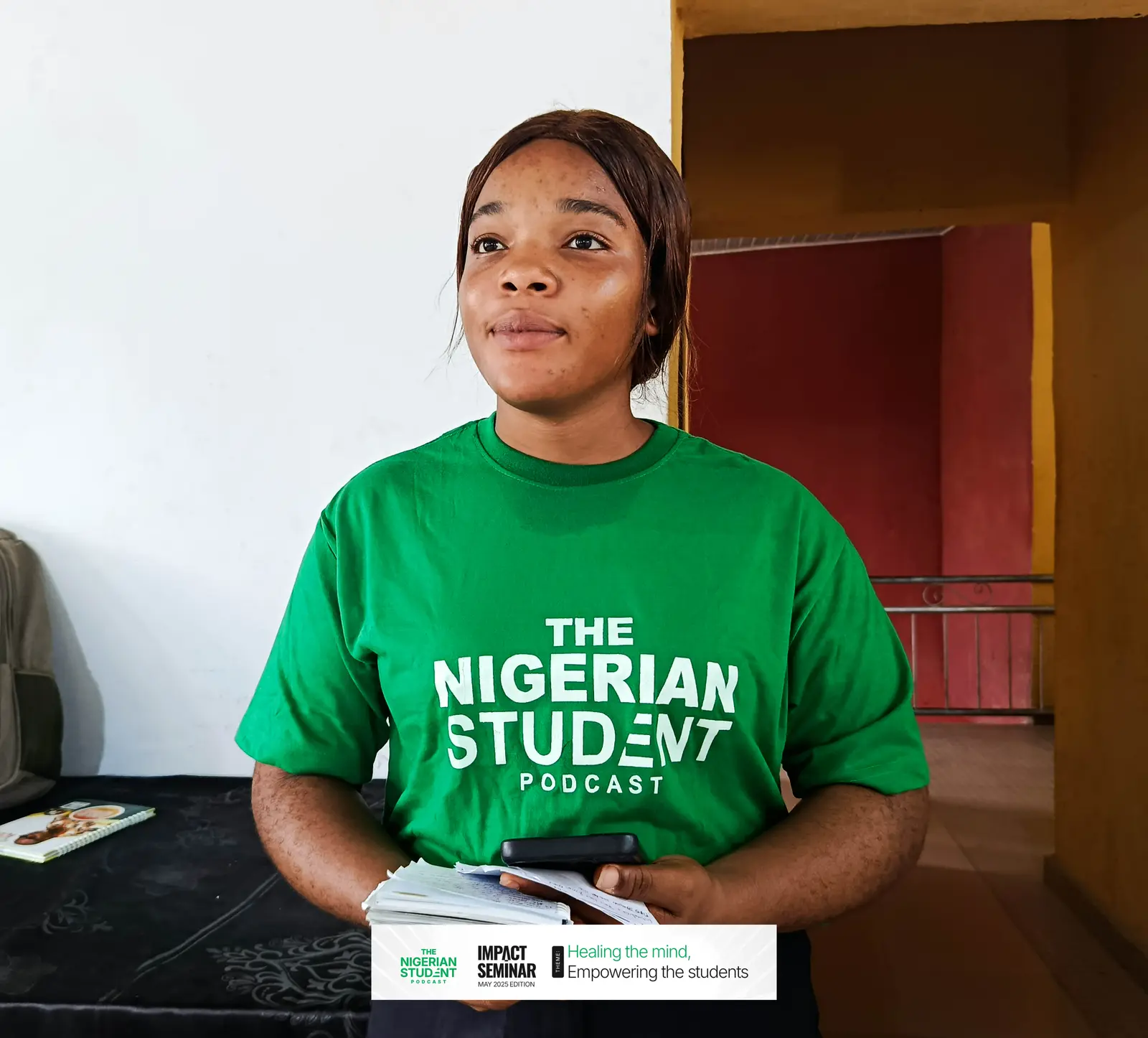A student in an NSP T-shirt